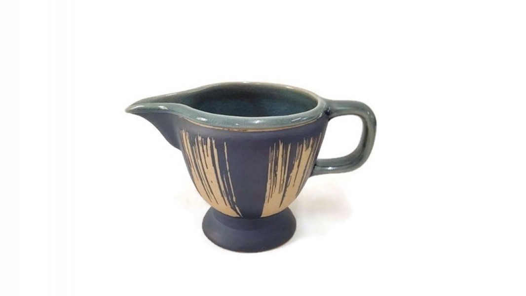 Blue Pitcher with ground coffee design