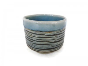 CELADON TUMBLER TEA CUP WITH BLACK SWIRL DESIGN