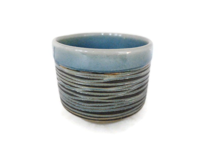 CELADON TUMBLER TEA CUP WITH BLACK SWIRL DESIGN